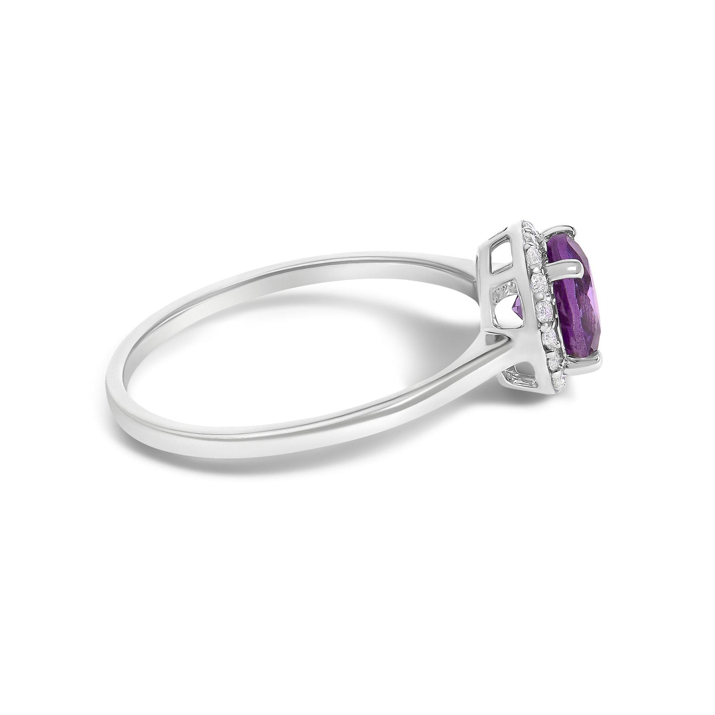 Side angle view of a white metal ring with a round purple gemstone in a four-prong setting, surrounded by small round white gemstones in a shared prong setting.