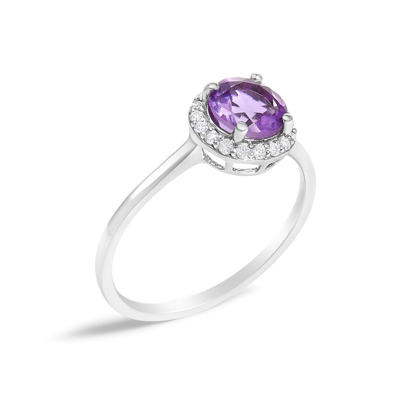 White metal ring with a round purple gemstone center in a four-prong setting, surrounded by round white gemstones in a shared prong setting, shown at an angled top view.