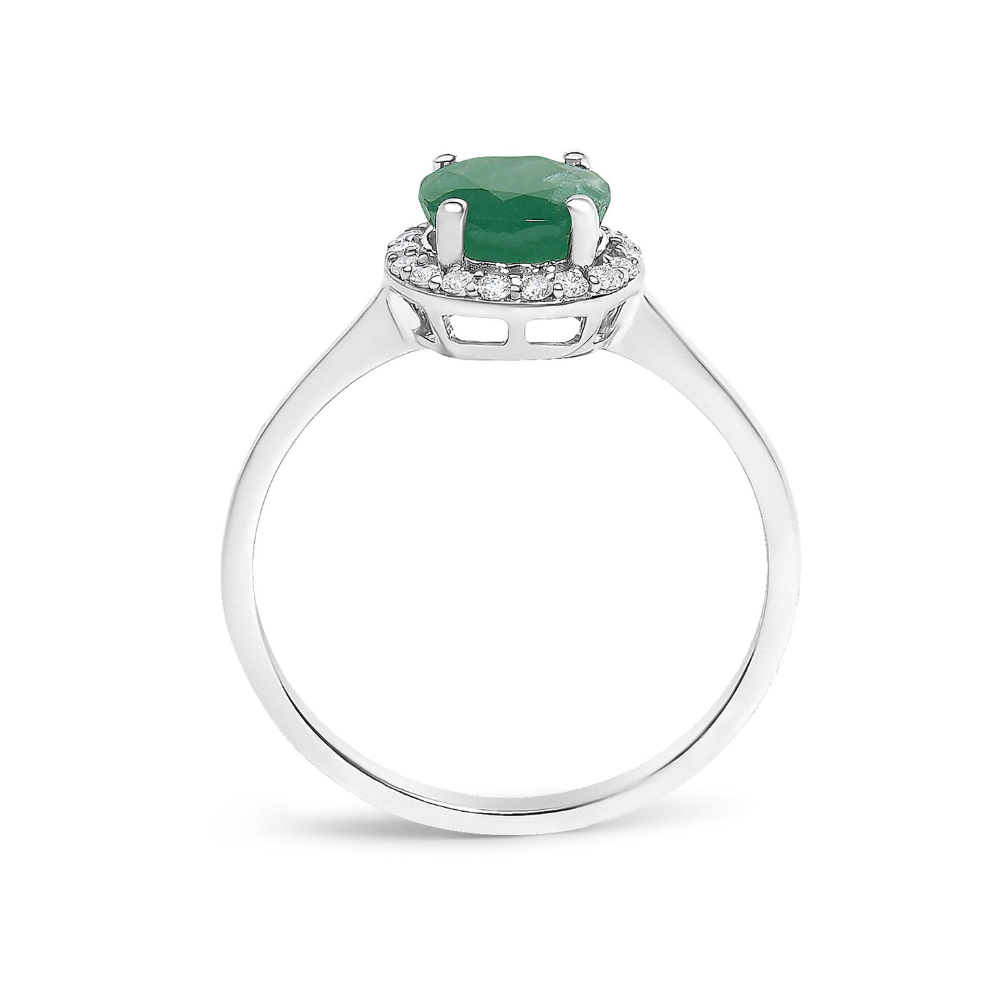 Close-up front view of a white metal ring featuring a central round green gemstone set with four prongs, surrounded by a halo of round white gemstones in a shared prong setting.