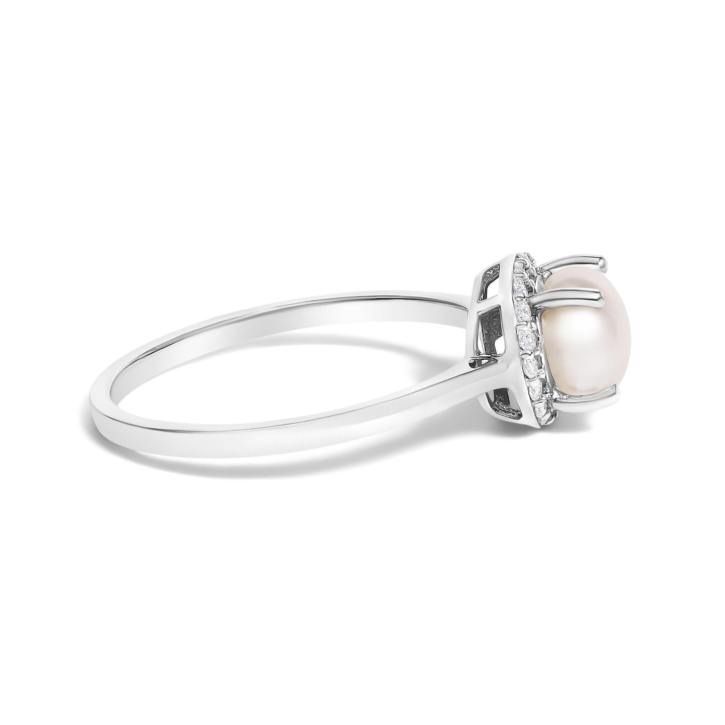 Side view of a white metal ring with a round center pearl and a halo of small white round gemstones in shared prong setting.