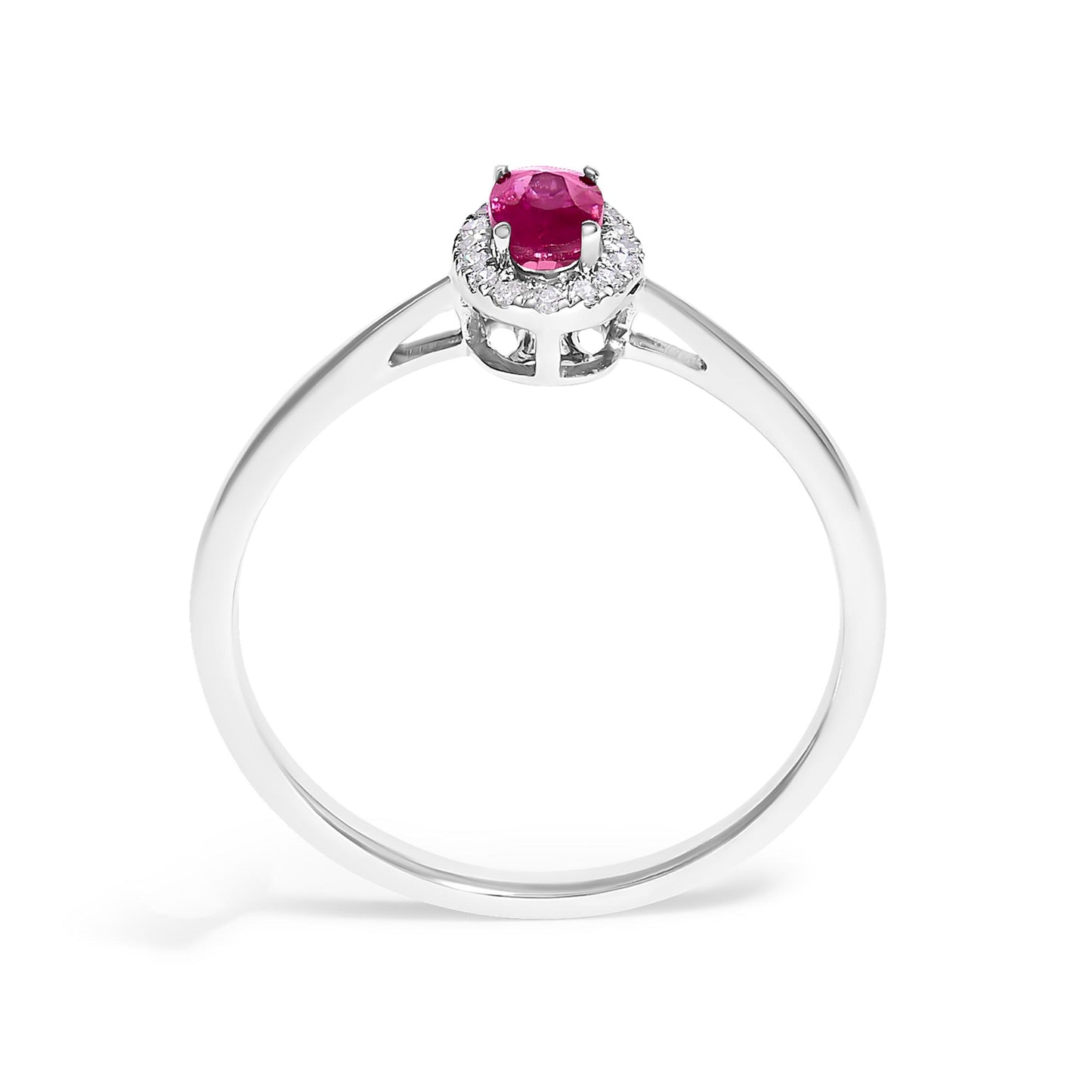 Front angle view of a white metal ring featuring a red oval gemstone in a prong setting, surrounded by small white round gemstones in a micro-pave setting.