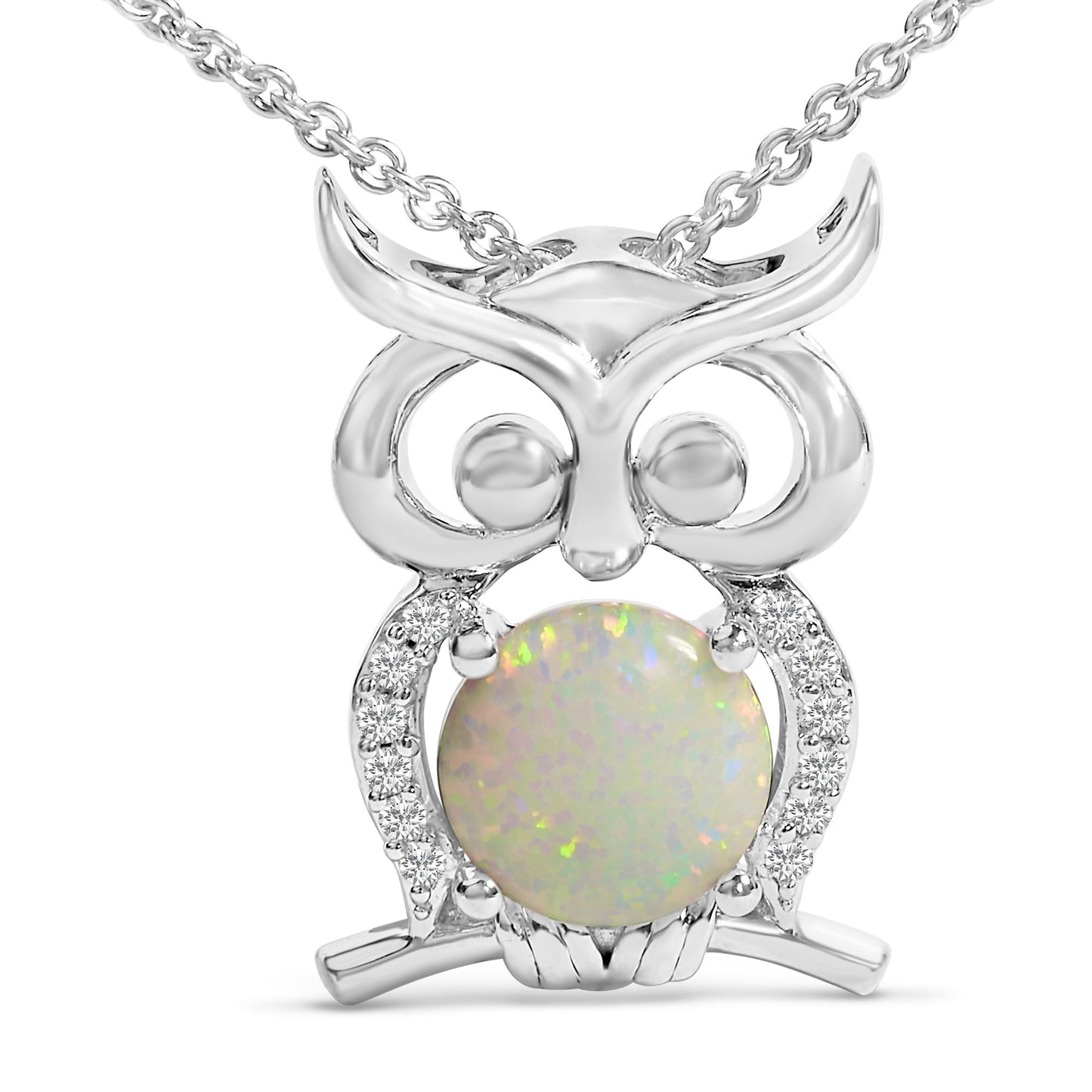 Close-up front angle of a white metal owl-shaped necklace pendant featuring a round white opal gemstone in the center and surrounded by multiple small white gemstones along the body, shown on a white background.