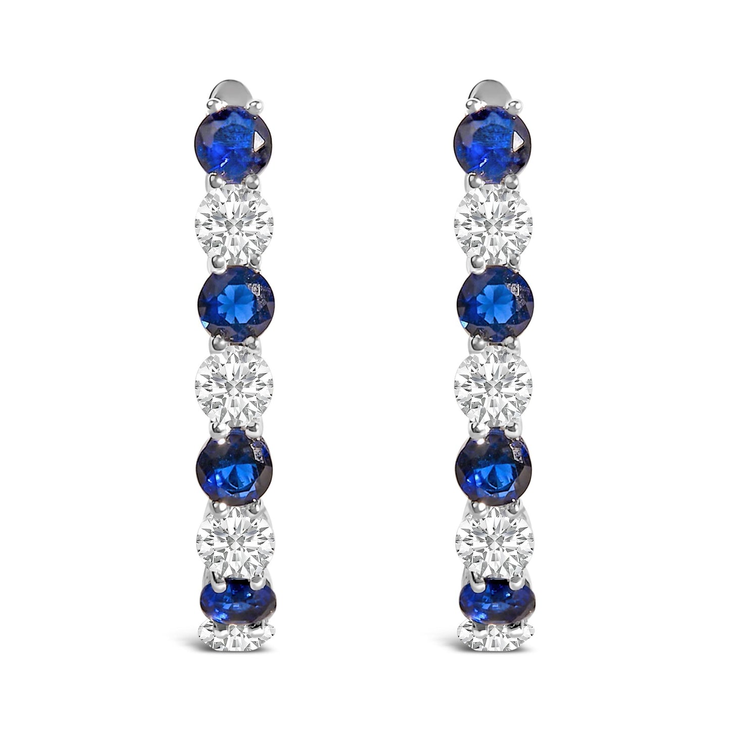 Pair of white metal earrings shown from the front, featuring a vertical row of alternating blue and white round gemstones in shared prong settings.