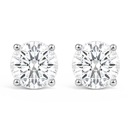 Pair of white metal stud earrings with round white gemstones in 4-prong settings, shown in a front-facing angle on a white background.