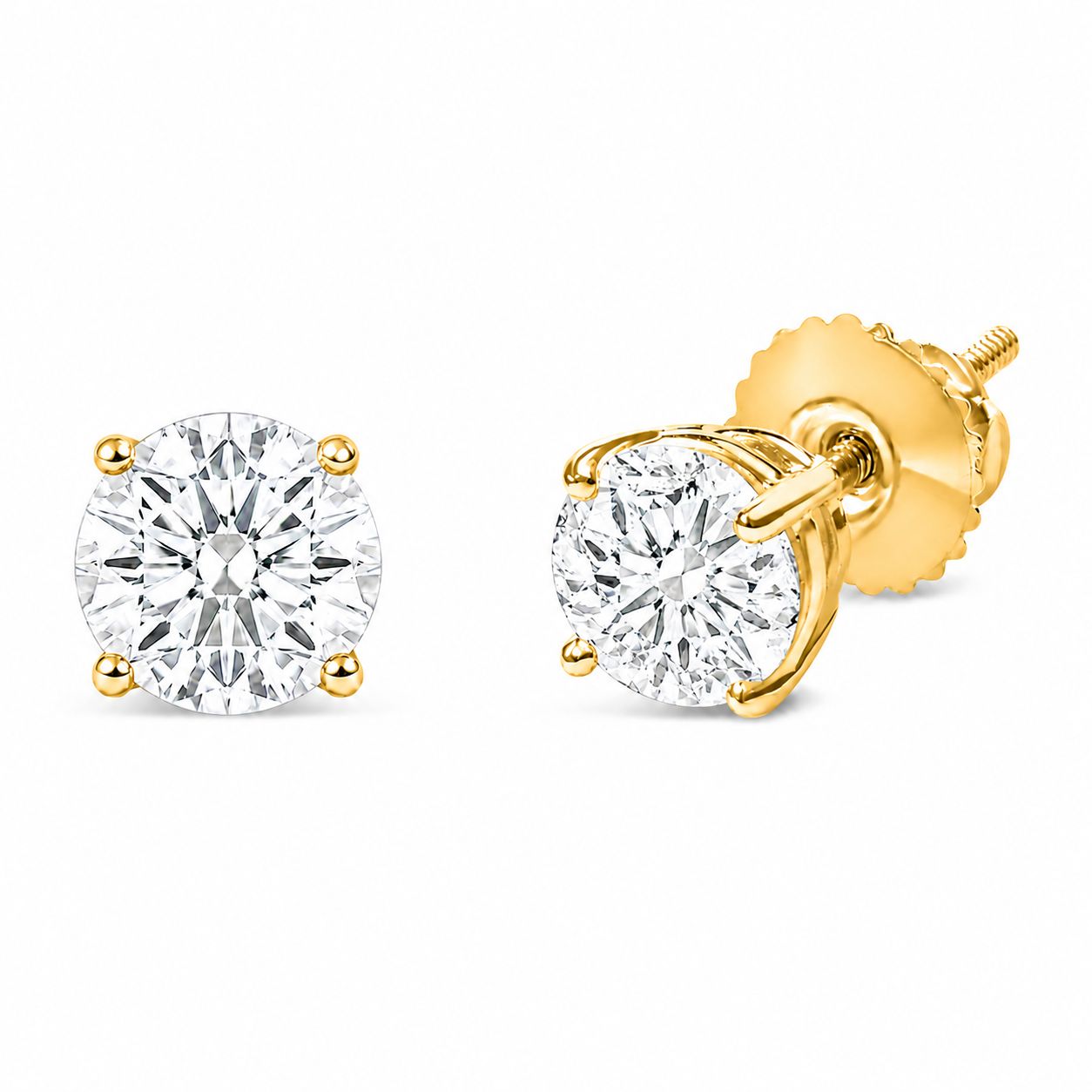 Pair of yellow metal stud earrings with round white gemstones in 4-prong settings shown from front and side angles on a white background.