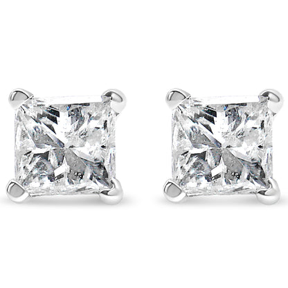 Front view of white metal stud earrings with square-shaped white gemstones in four-prong settings.