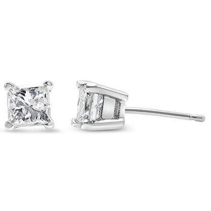 Close-up front and side view of a pair of white metal stud earrings with square-shaped white gemstones in 4-prong settings.