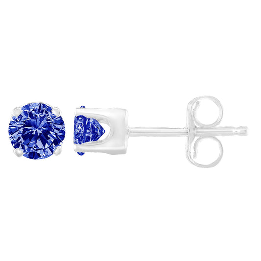 Close-up side view of a white metal stud earring with a round blue gemstone in a prong setting.