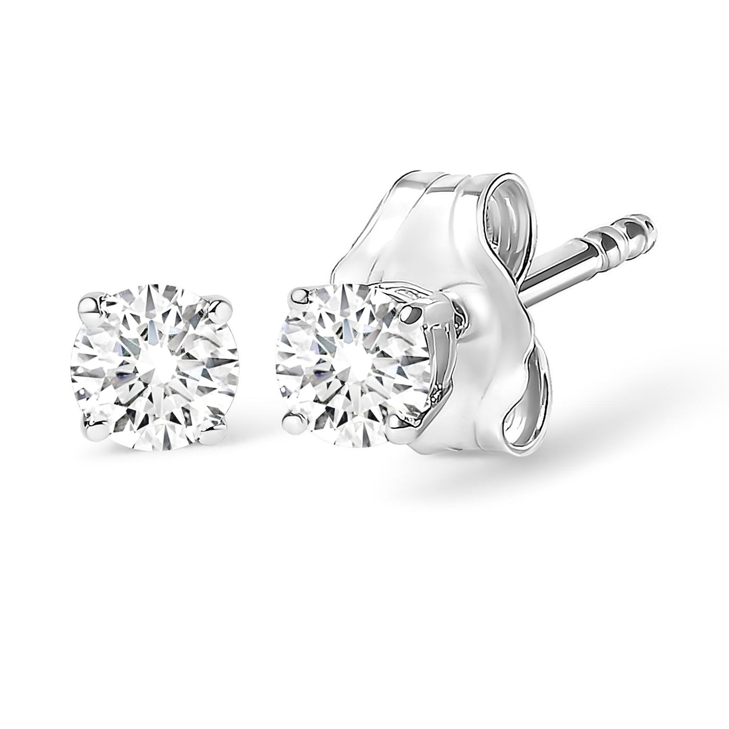 Close-up front and side angle of a pair of white metal stud earrings each set with one round white gemstone in a four-prong setting.