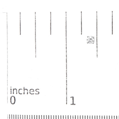 Single white metal stud earring with a round white gemstone in a four-prong setting, shown on a ruler for size reference, front angle.