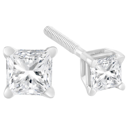 Close-up front and side angle of white metal stud earrings with princess-shaped white gemstones in prong settings.