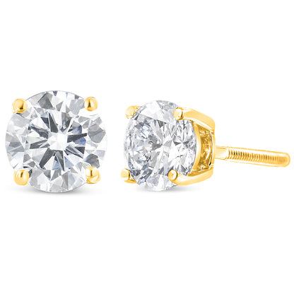 Pair of yellow metal stud earrings with round white gemstones in prong settings, shown from front and side angles on a white background.