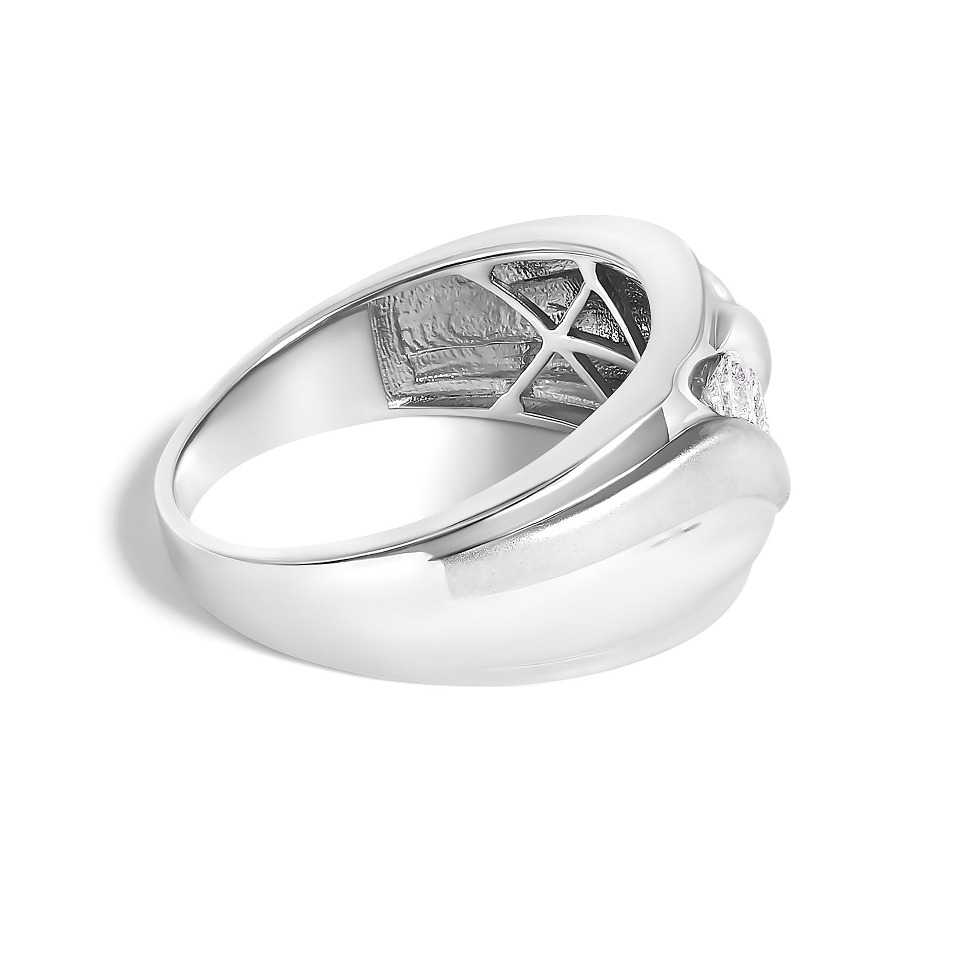 White metal ring shown at an angled top view, featuring three round white gemstones set in a channel setting.