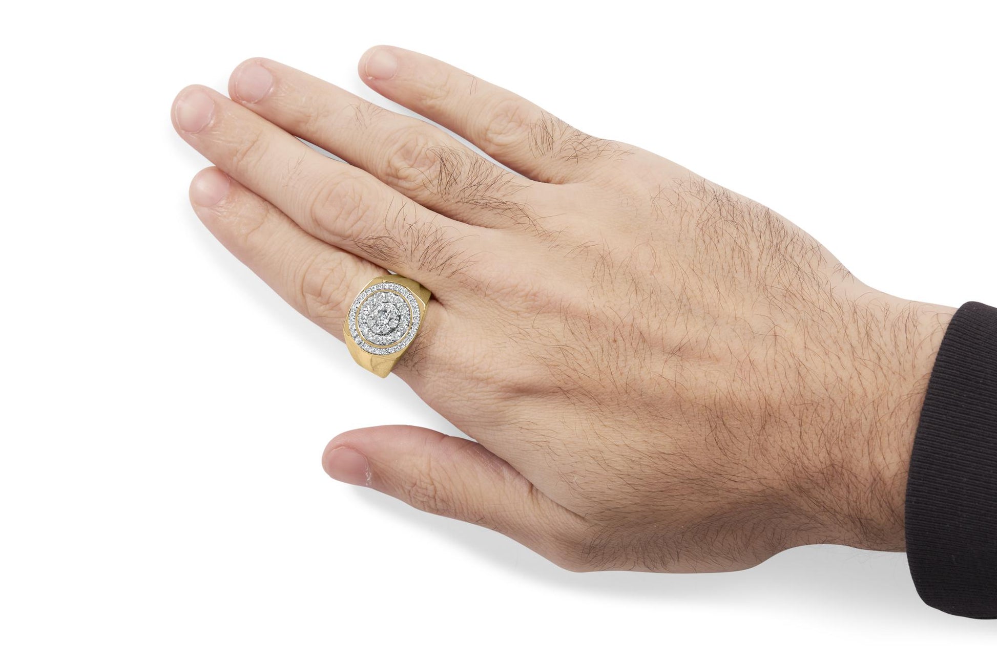 Close-up shot of a man's hand wearing a yellow and white metal ring with multiple round brownish gemstones in prong settings, centered on the ring finger.