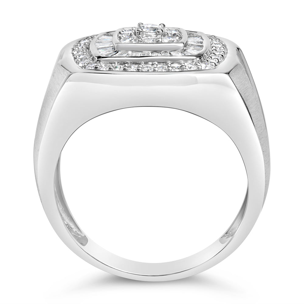 White metal ring shown from the front angle with a raised top featuring a central rectangular cluster of round and baguette white gemstones in prong and channel settings.