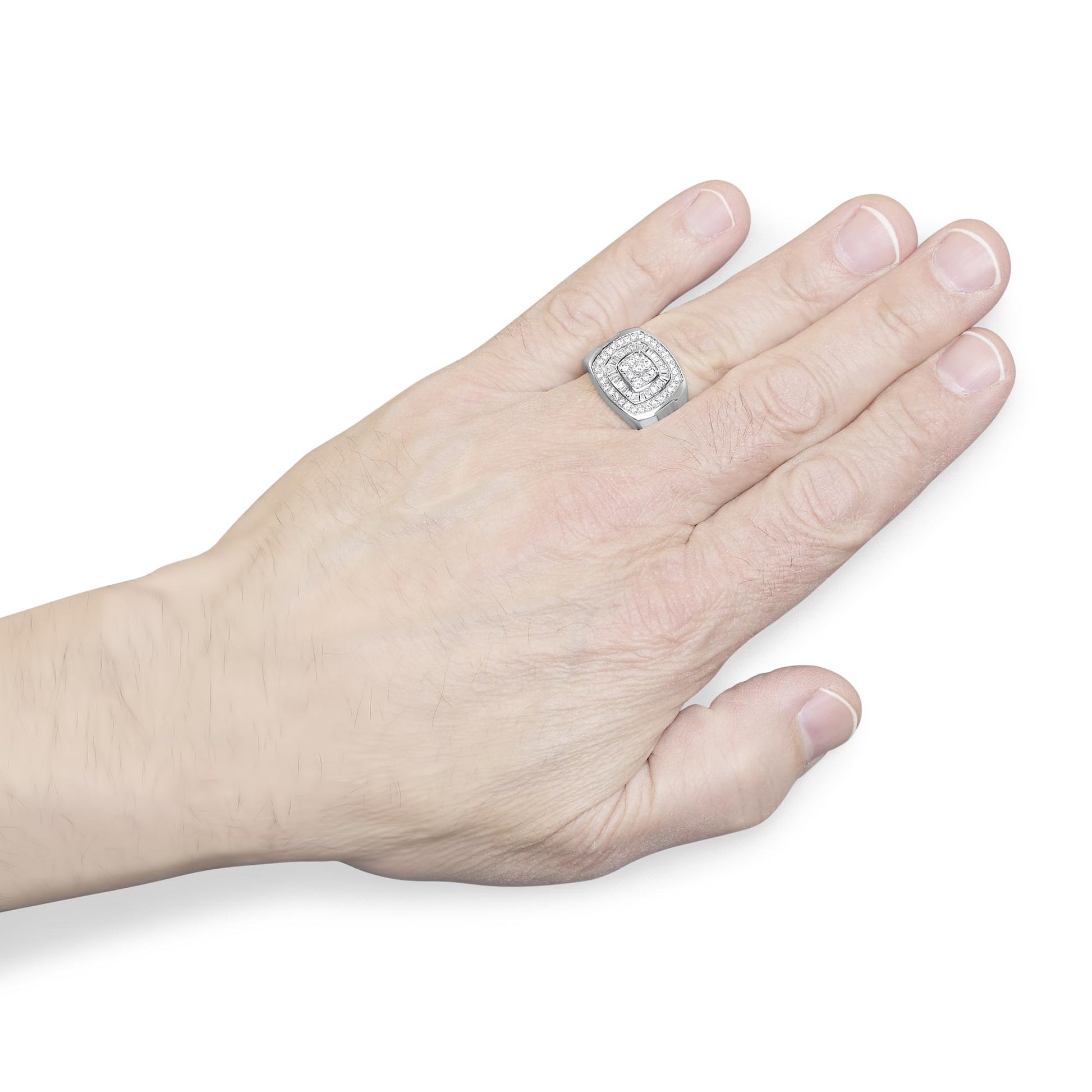 White metal ring with round and baguette-shaped white gemstones in prong and channel settings, worn on a hand shown from a top angle.