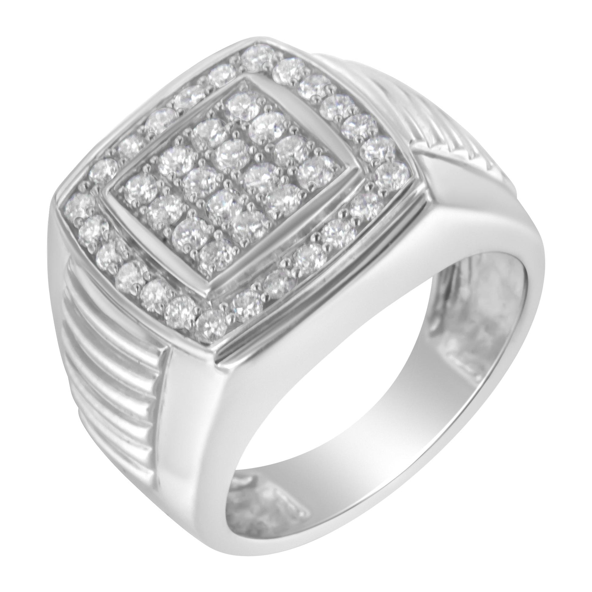White metal ring shown at an angled top-down view, featuring two rows of round white gemstones in prong settings surrounding multiple round white gemstones arranged in a square cluster at the center, with ribbed detailing on the sides.