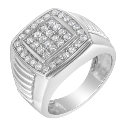 White metal ring shown at an angled top-down view, featuring two rows of round white gemstones in prong settings surrounding multiple round white gemstones arranged in a square cluster at the center, with ribbed detailing on the sides.