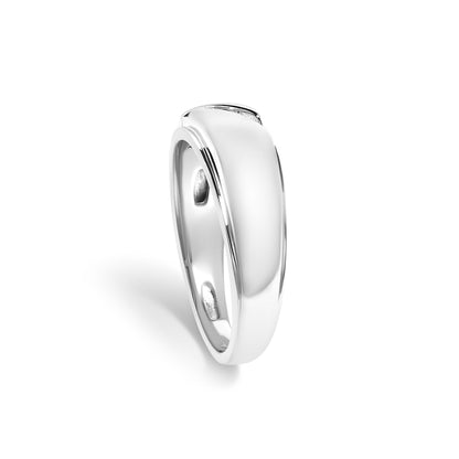 Close-up front angle of a white metal ring with a smooth, wide band featuring a channel setting of three round white gemstones on the top.