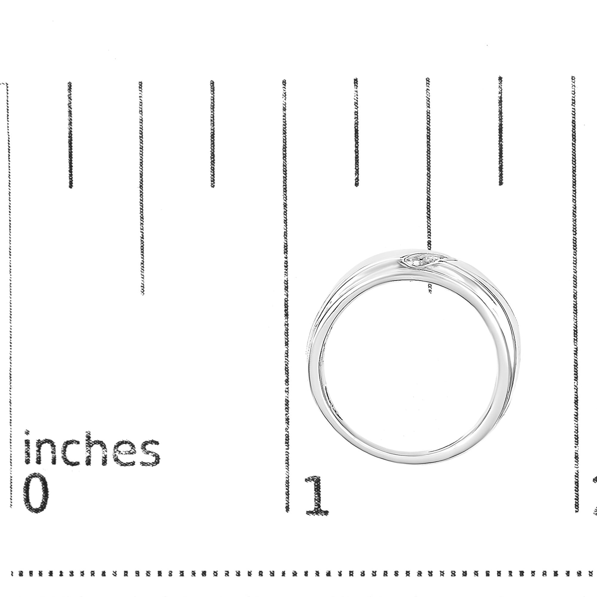 White ring with three round white gemstones in a channel setting, shown on a scale, top-down angle.