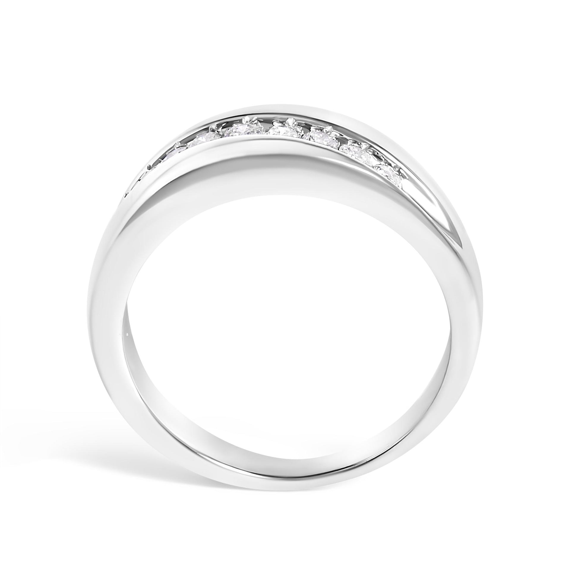 White metal ring with a curved band design featuring a channel setting of round white gemstones, shown from a front angle.