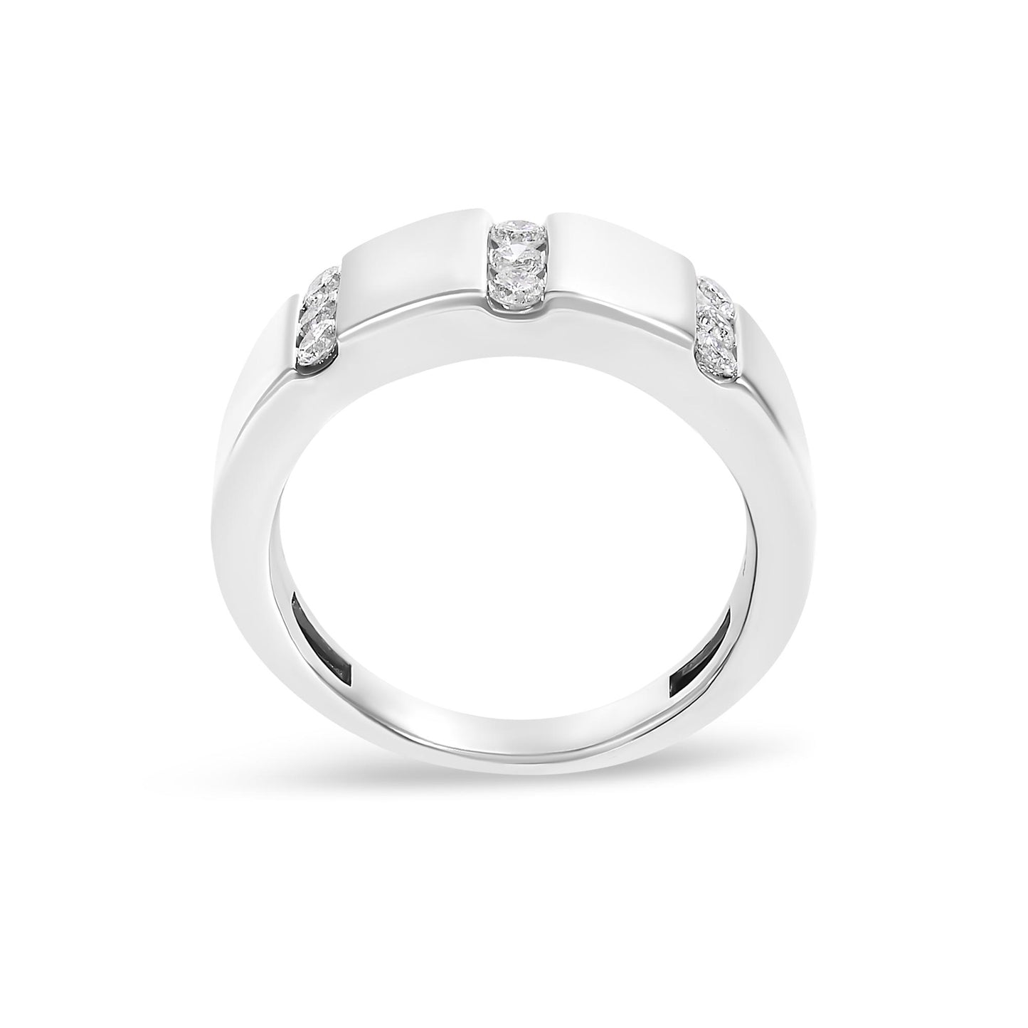 White metal ring with three sections of channel-set round white gemstones, shown from a side angle on a white background.
