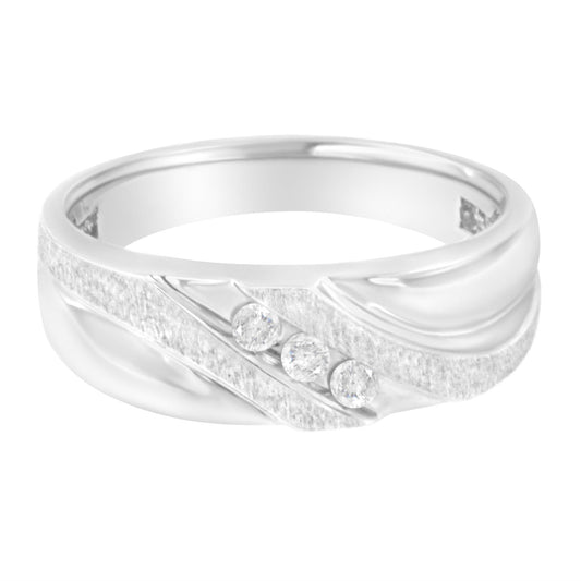 White metal ring with three round white gemstones in a channel setting, front angled view.