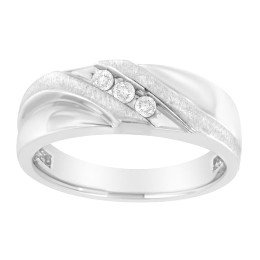 White metal ring with three round white gemstones in a channel setting, shown in a front angled view.