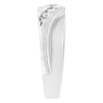 Close-up side angle of a white ring with a modern curved design featuring three channel-set round white gemstones.