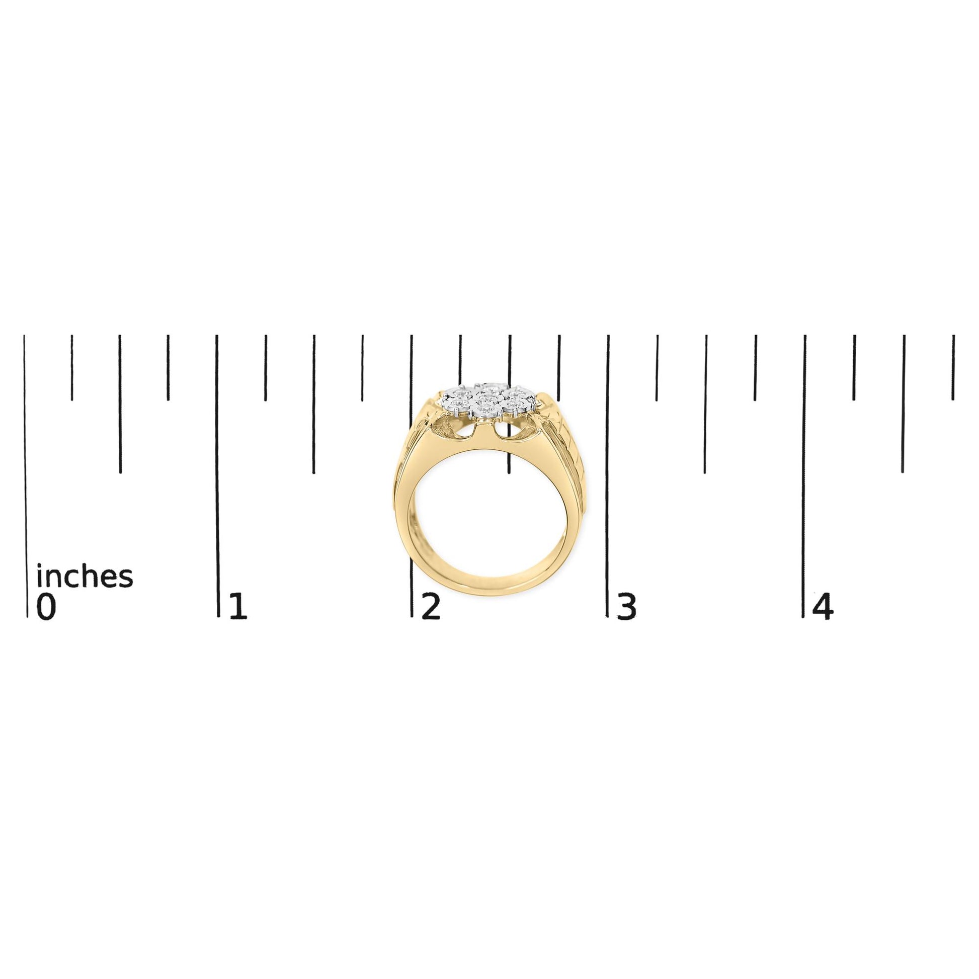 Yellow metal ring with cluster of white round gemstones in miracle setting, shown from front angle on a ruler for size reference.