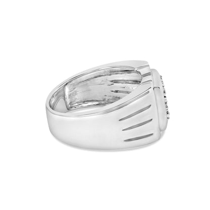 Side angle view of a white ring with a broad band and vertical grooves near the setting, featuring a cluster of round white gemstones in a miracle setting.