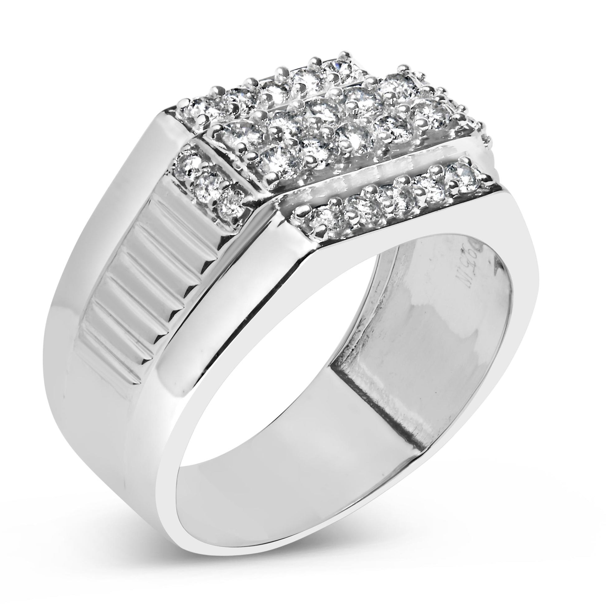 Close-up angle of a white metal ring with a square top featuring multiple round white gemstones in prong settings and additional gemstones along the band edges.