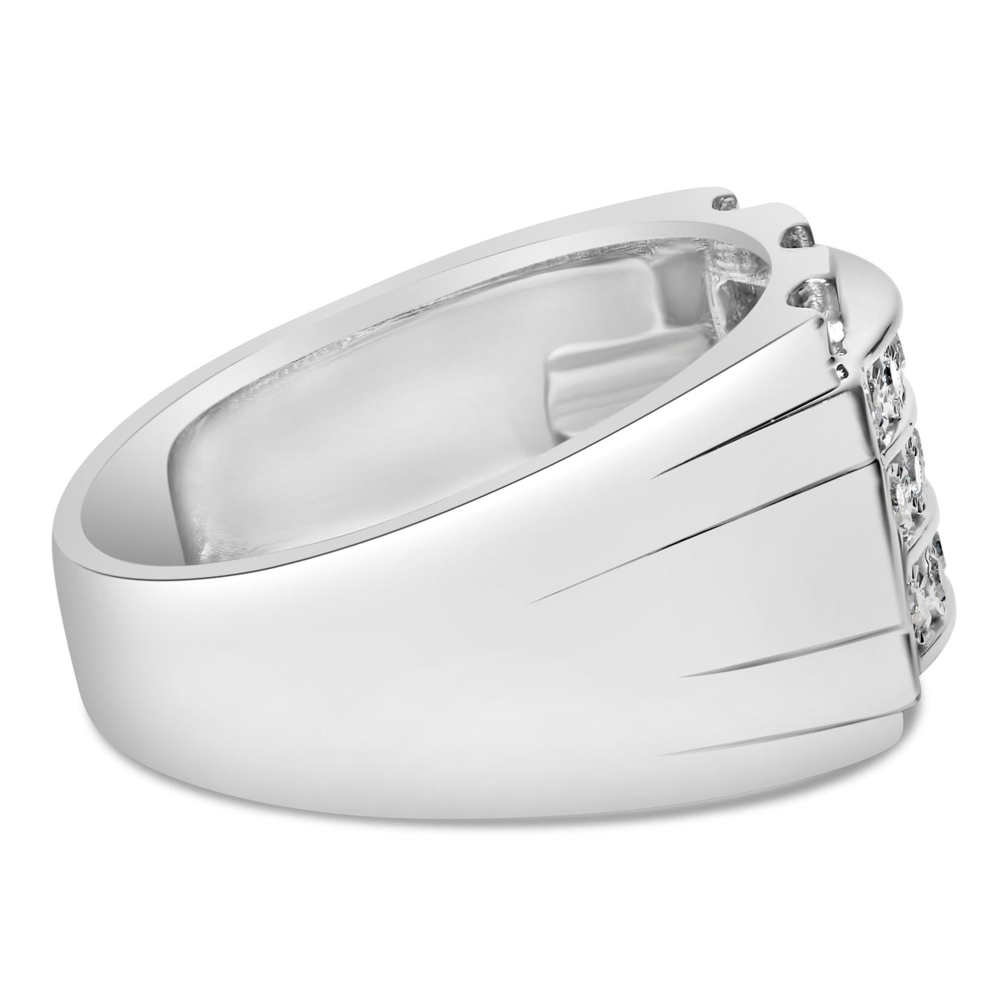 Close-up side angle of a white metal ring featuring a cluster of round white gemstones in miracle and channel settings on the front.