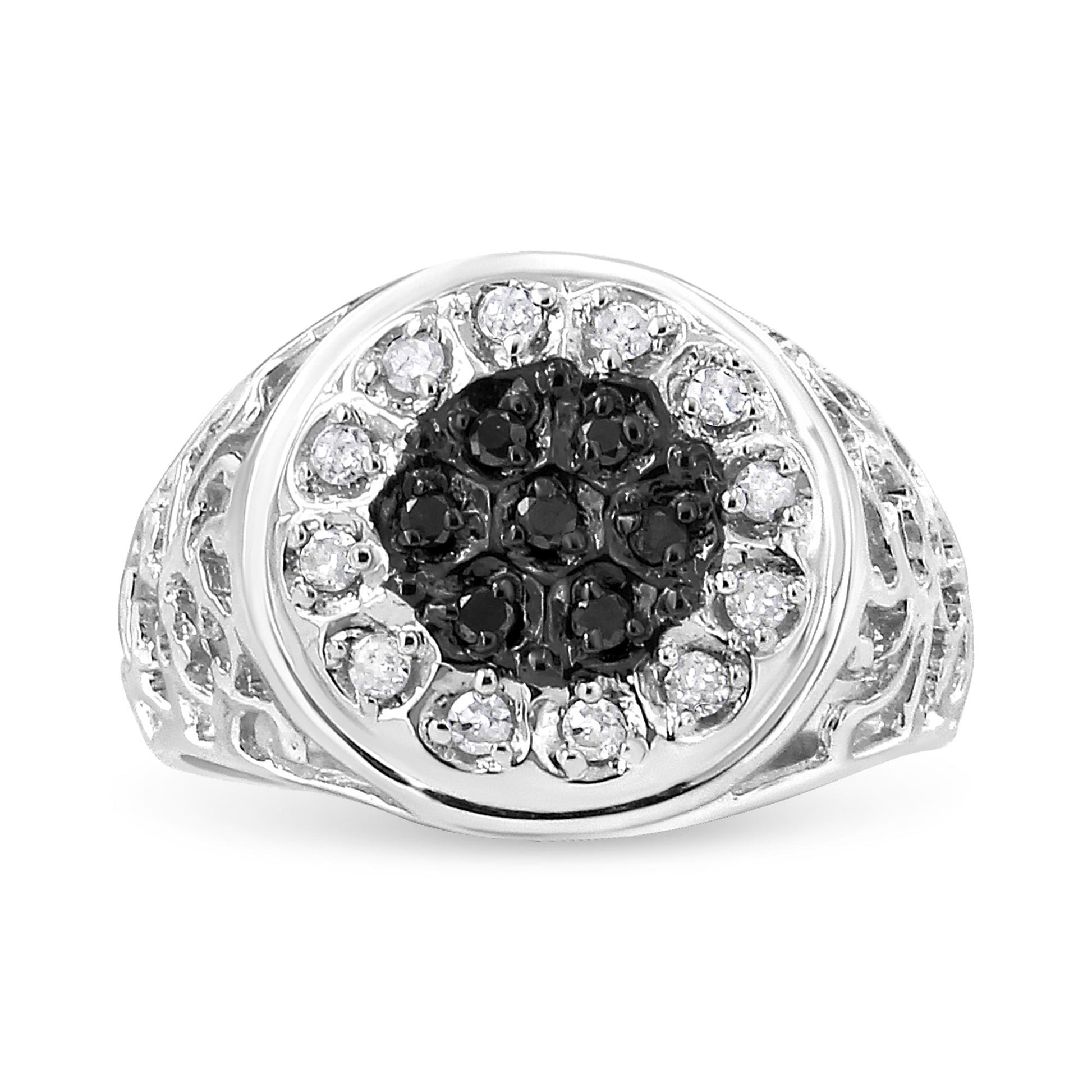 Front angle view of a white metal ring featuring round black gemstones in the center surrounded by round white gemstones, all in prong settings, with detailed band sides.