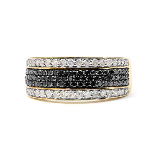 Close-up front view of a yellow metal ring featuring three horizontal rows of prong-set round white and black gemstones.