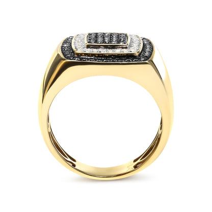 Front-facing view of a yellow ring with concentric rectangular layers of black and white round gemstones set in prongs on the top.