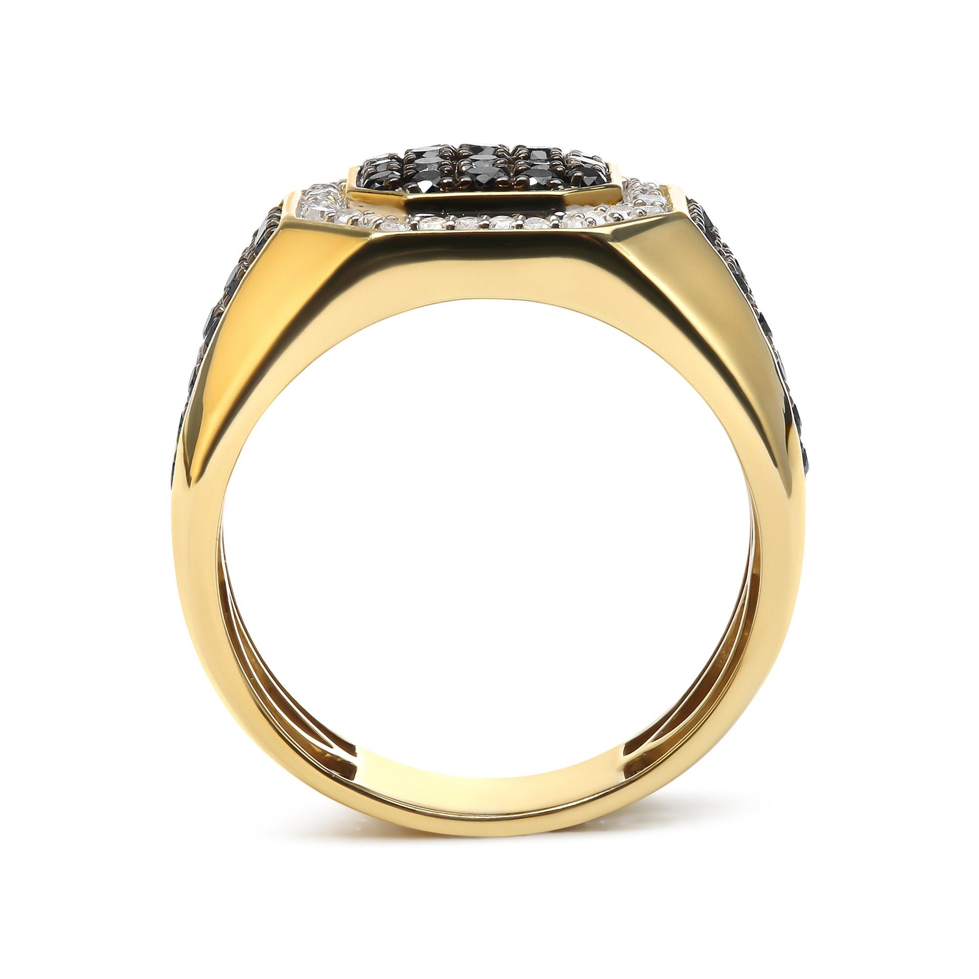 Yellow metal ring with black and white round gemstones set in prongs, shown from the side angle.