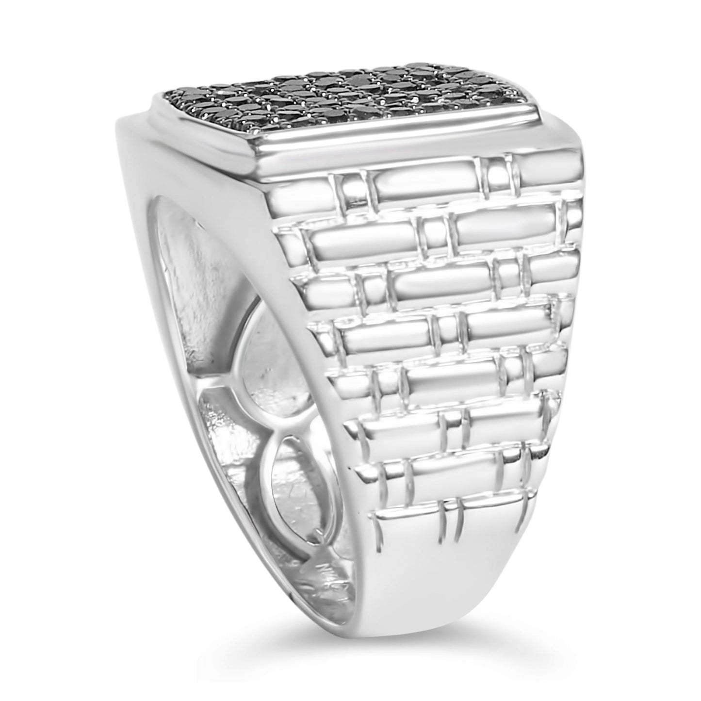 Close-up front angle of a white ring with a square top set with multiple round black gemstones in prong settings and a textured band resembling a brick pattern.