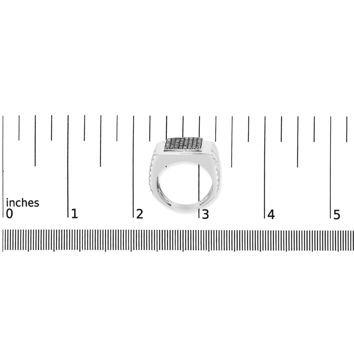 Image of a white ring with a rectangular top surface set with multiple round black gemstones in prong settings, shown on a measurement scale from above.