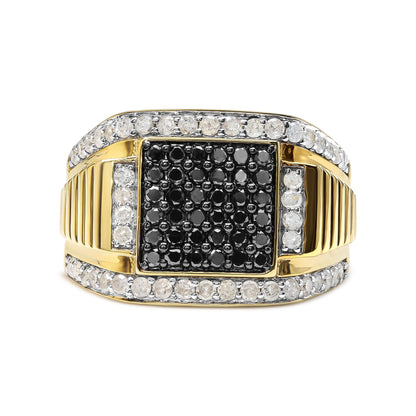 Front-facing view of a yellow ring featuring a central square cluster of black gemstones surrounded by rows of white gemstones along the top and bottom edges and smaller vertical rows on either side.