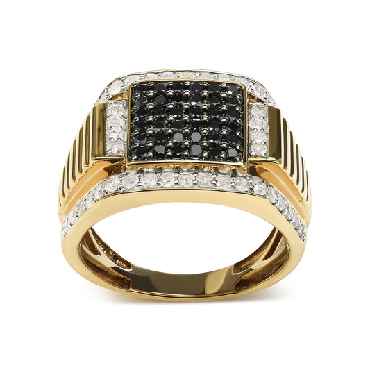 Front angle view of a yellow metal ring with a rectangular cluster of black round gemstones in prong settings, bordered by rows of white round gemstones in prong settings along the top and sides.