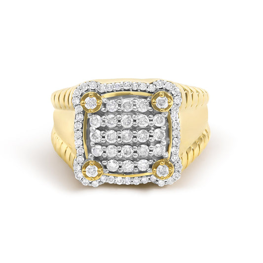 Close-up front angle of a yellow metal ring with multiple round white gemstones in prong settings arranged in a rectangular cluster on top.