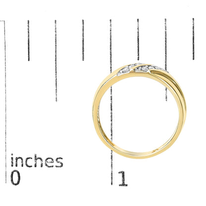 Yellow ring with overlapping bands accented with white round gemstones in prong settings, shown on a scale, angled slightly from above.