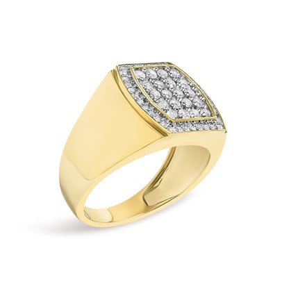 Yellow metal ring with a marquise-shaped face set with white round gemstones in prong settings, shown at an angled close-up.