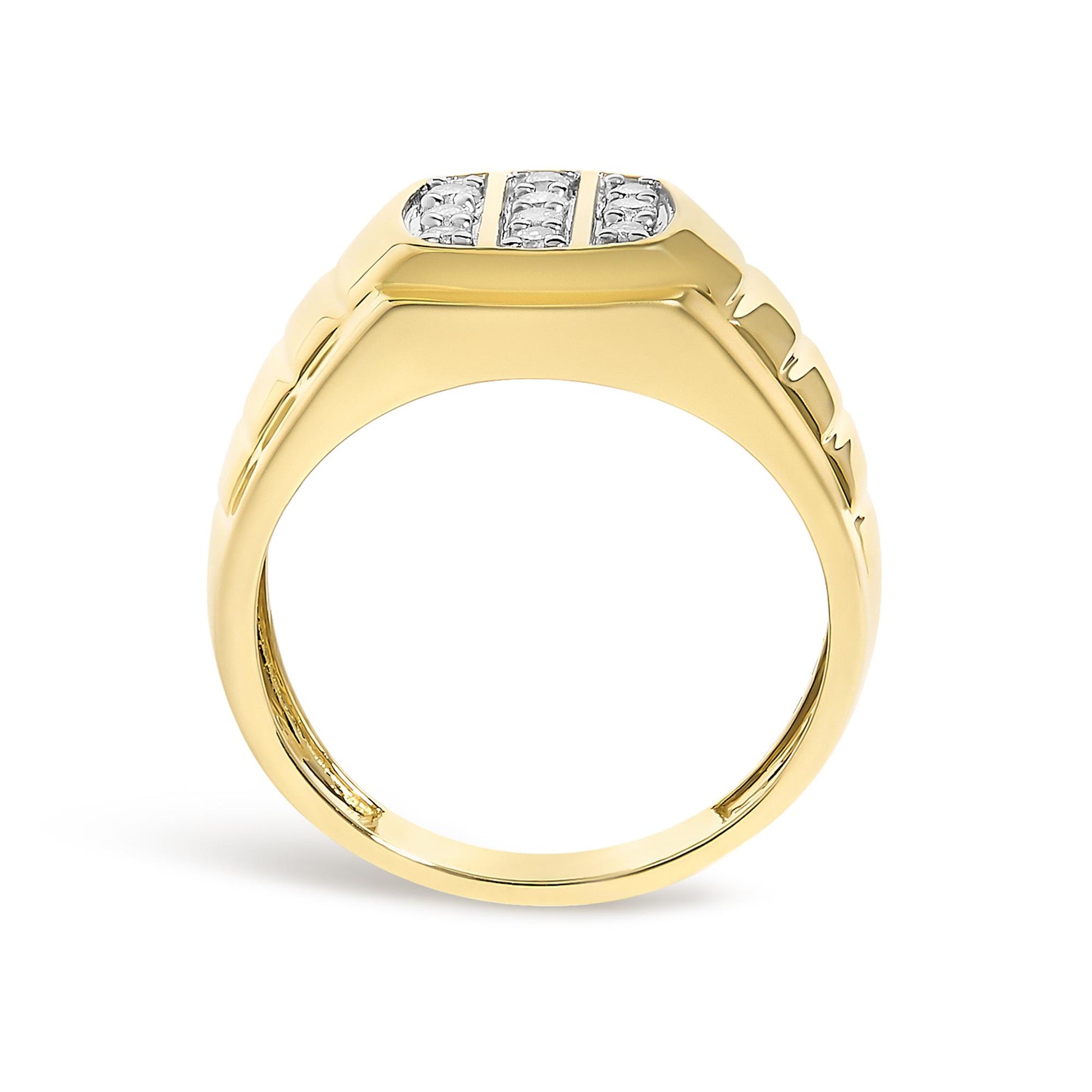 Yellow metal ring with groupings of round white gemstones set in prongs, viewed from a front angle.