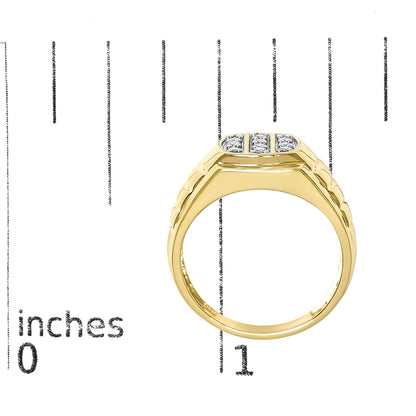 Close-up front view of a yellow metal ring with a rectangular top featuring three rows of round white gemstones in prong settings, shown on a scale.