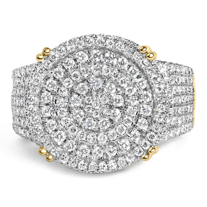 Close-up front angle of a yellow metal ring featuring an oval-shaped top covered with multiple small white gemstones in a layered circular design.