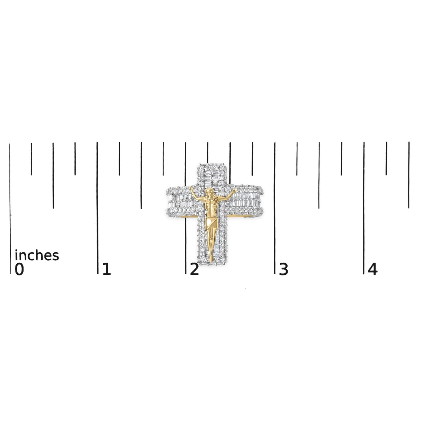 Close-up front angle of a yellow metal ring with a religious figure in the center, surrounded by multiple rows of round and baguette-shaped white gemstones, shown on a scale with inch measurements.