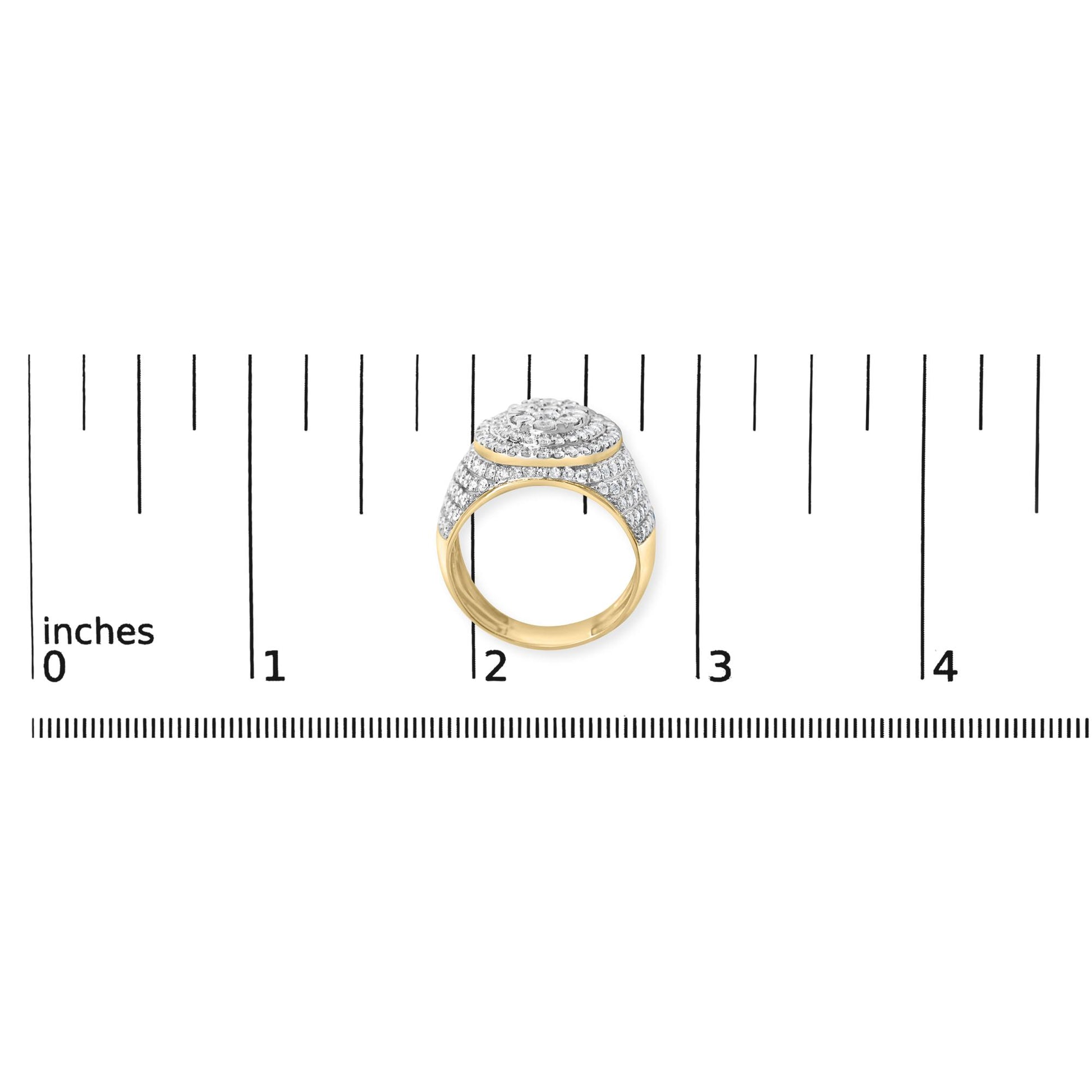 Yellow metal ring with a dome-shaped top covered in multiple rows of round white gemstones in prong settings, shown on a ruler scale from a frontal angle.