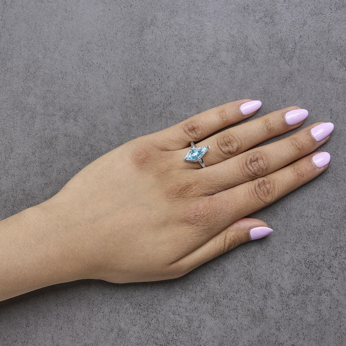10K White Gold Blue Topaz Kite Cut and 1/6 Cttw Diamond Cocktail Ring